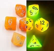 Orange/White Set of 7 Fusion Glow In Dark Polyhedral Dice with Gold Numbers for D20 based RPG's
